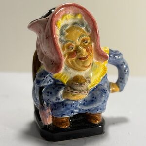 Charming Ceramic Lady Figurine with Blue and Pink Accents